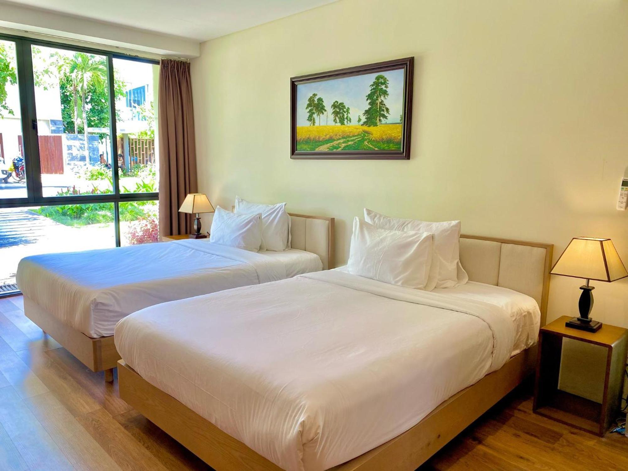Luxury Dana Beach Resort & Spa Дананг Номер фото